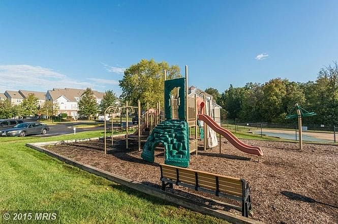 Playground, community center and pool