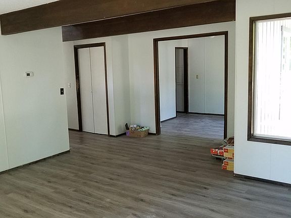 Formal living room looking into formal dining