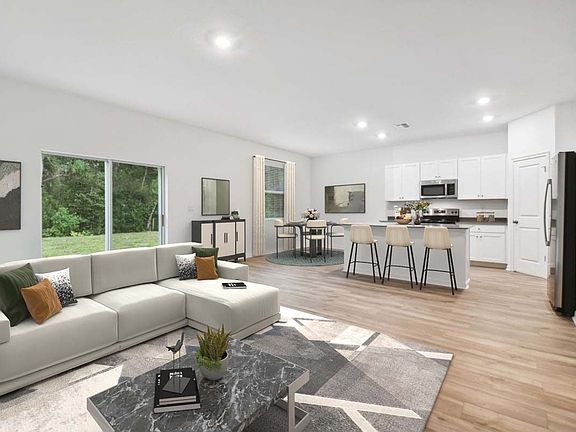 Casey Key new construction home plan family room Brooksville, Fl at Pinecone Reserve by William Ryan