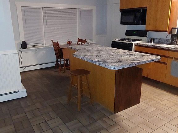 Kitchen with door to laudry room