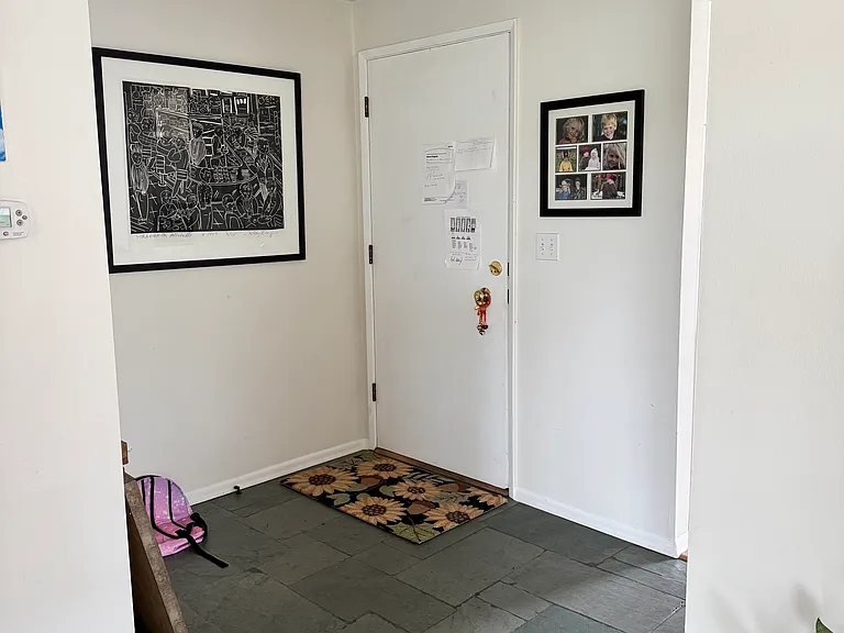 Front entry to house with large closet for storage