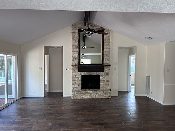 Living room and fireplace - master on left, 2nd bedroom on right