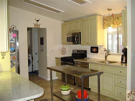 Another View of Kitchen with New Cabinets, Granite Counter Tops, Stainless Steel Appliances & Sink