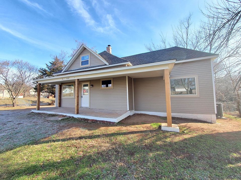 Front of house. sits off the street - behind a fenced yard