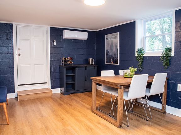 Dining area with additional bar cabinet.