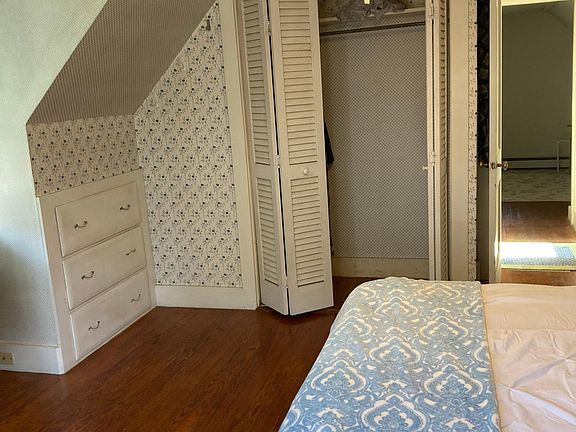 Master bedroom closet & sitting/desk area. 2built-in dressers