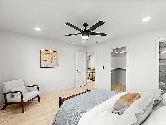 Master bedroom with walk-in closet and bathroom. No furniture.