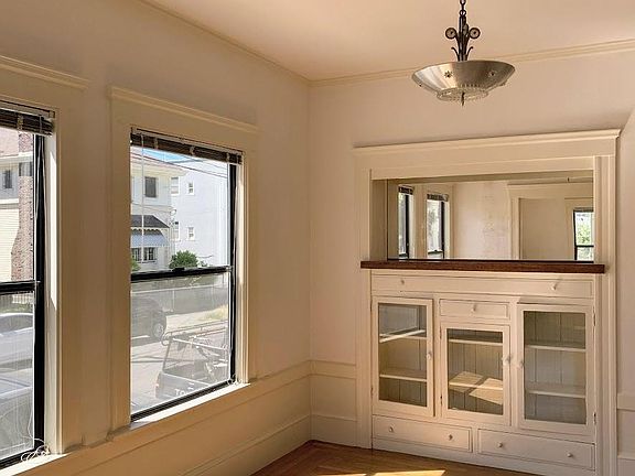 The dining room with a built-in china cabinet