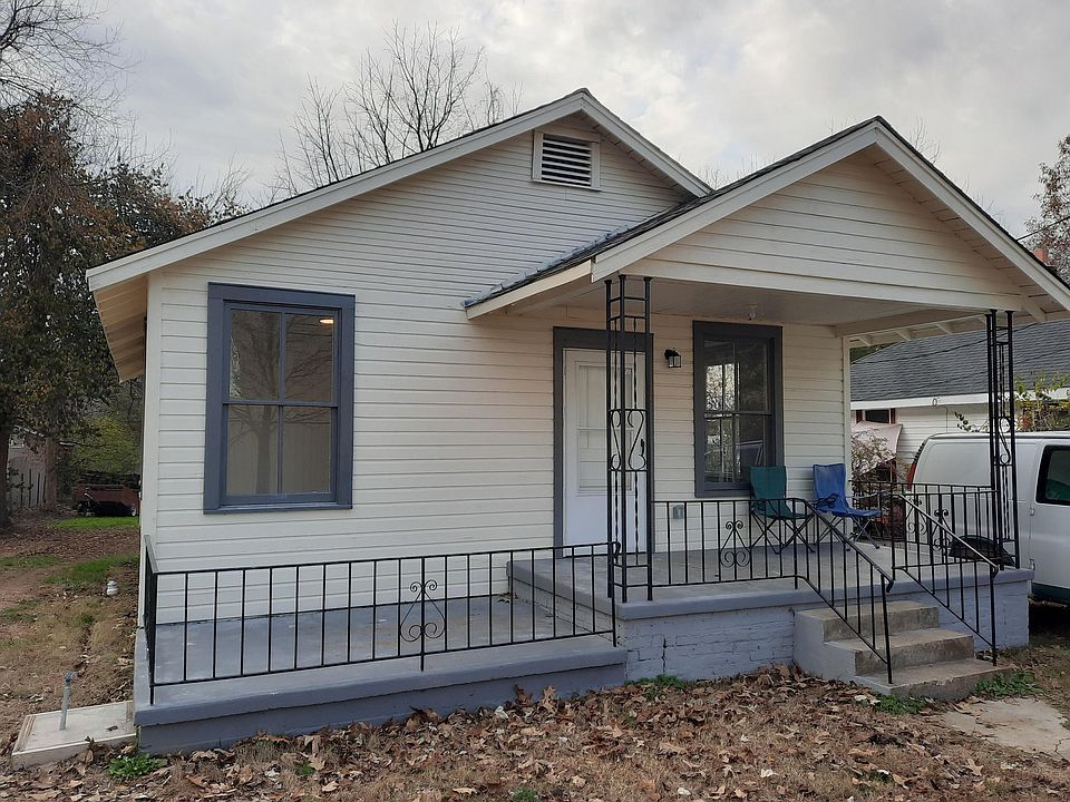 Fresh paint on original wood siding.