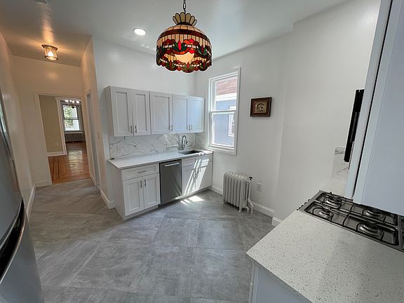 Kitchen with new stainless steel appliances