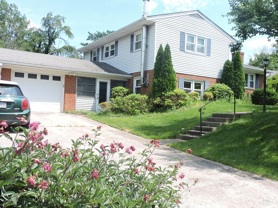 Driveway and side view of the house.