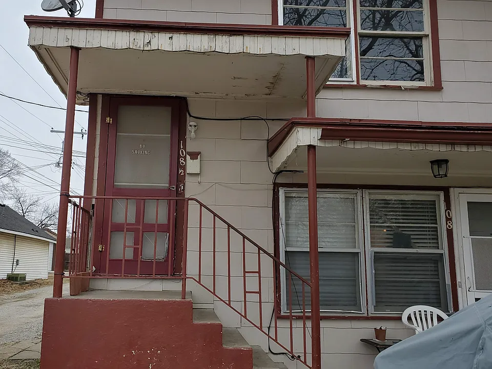 Upstairs unit facing 13th Street.
