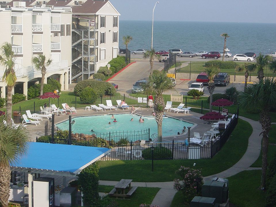 View over looking pool and Glaveston bay from Balcony