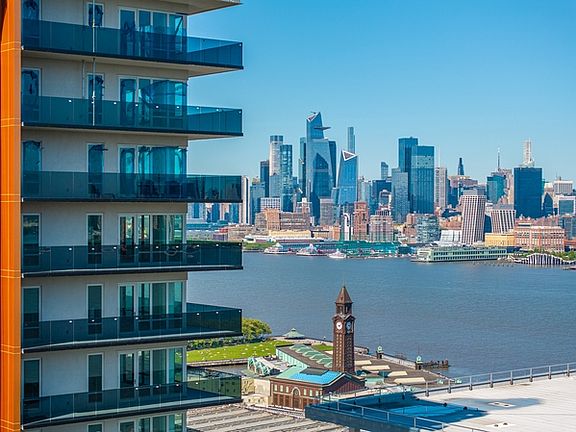 Soaring glass-railed balconies bring panoramic views right to you.