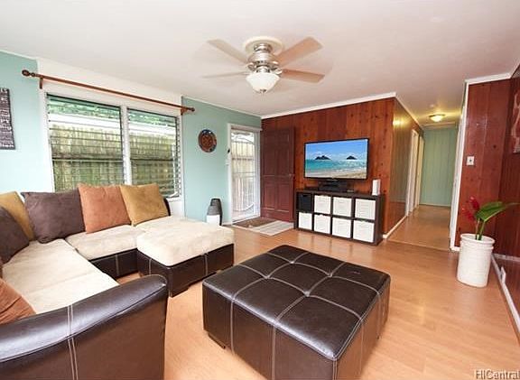 view from dining area showing the front door and hallway.
