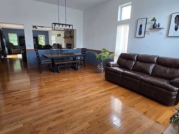 View from front entry of living room and dining room.