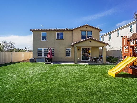 Large artificial grass backyard