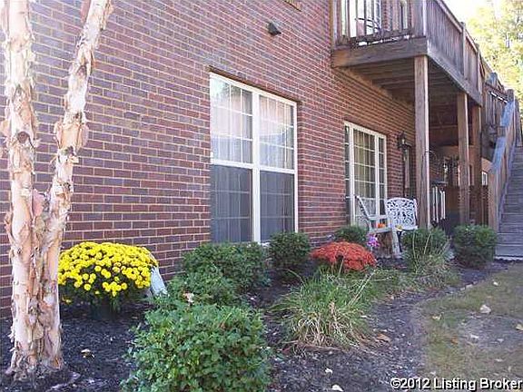 Corner view of your new home w/a patio area to enjoy some fresh air & listen to the birds while you have your morning coffee.