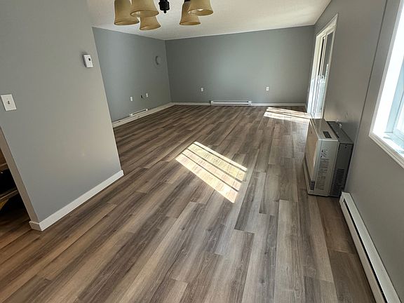 Living from Dining space (Kitchen access on left of pic)