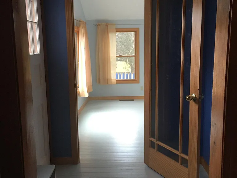 from kitchen through mudroom to studio