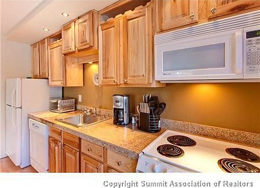 beautiful wood floors and granite counters
