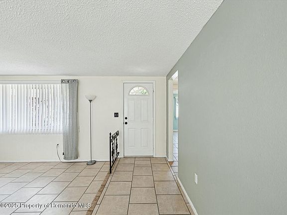 5th image of 8202 Woodsong Row