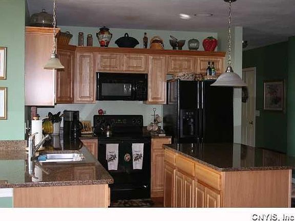 Kitchen features granite counter tops