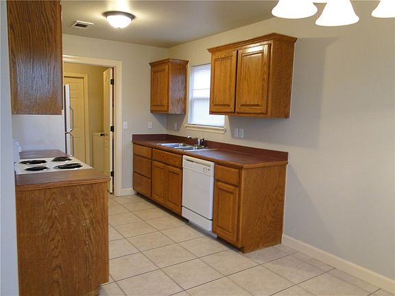 Kitchen with eat in dining area.