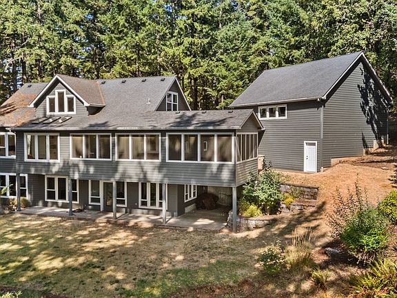 Home is situated on 3.51 wooded acres.