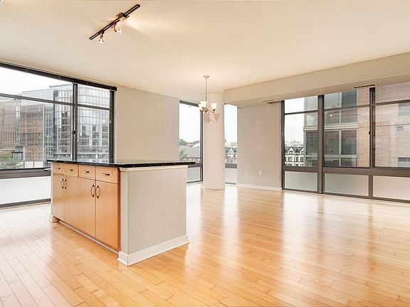 Open kitchen, living and dining areas. Tons of sunlight and fantastic views.