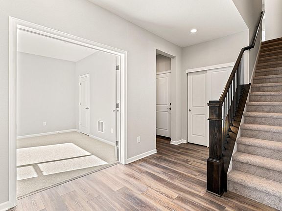 Foyer, mudroom, 1st bedroom or office