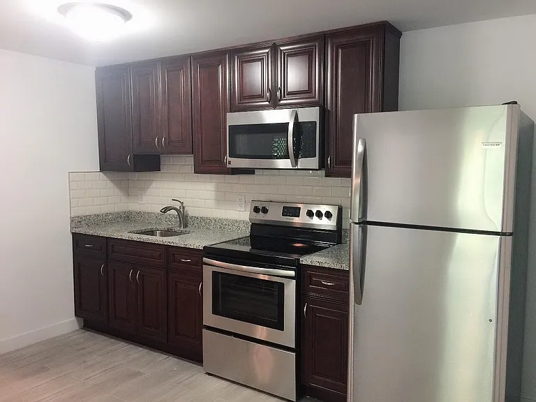 Gorgeous kitchen with stylish stainless steel appliances