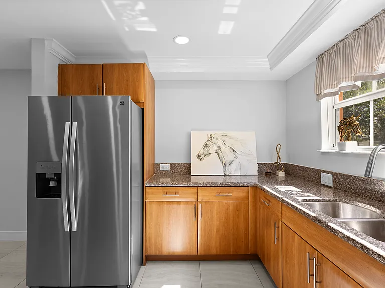 Sun lit spacious kitchen.