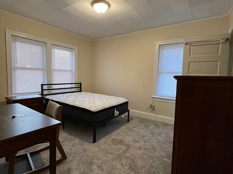 Old bedroom furniture with new bed. See the new pictures with light colored wood .
