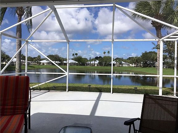 Large Porch/Pation and Lake Views to rear of home