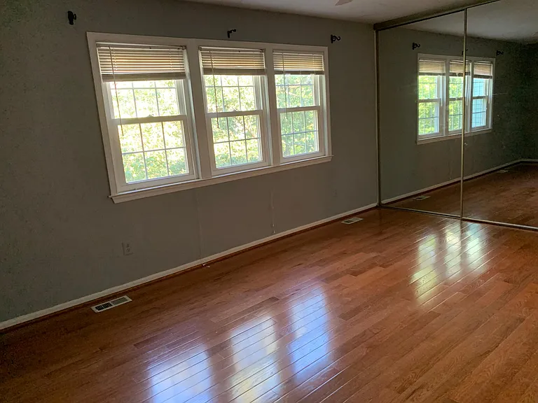 Master Bedroom with hardwood floor