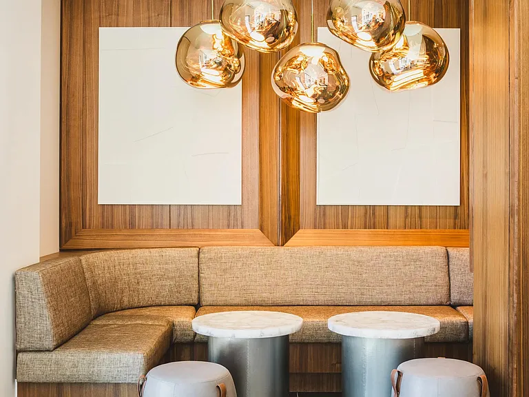 Chic seating, sunlit vibes_Modera Parkside makes lounging look good.