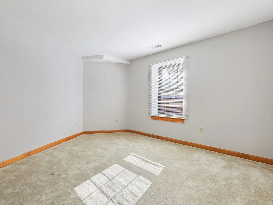 Unit 311 bedroom photographed February 2026. Features vary by apartment.