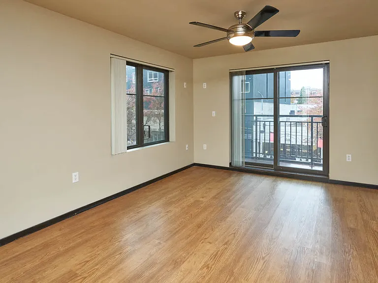 Living Room with Balcony and Hard Surface Flooring