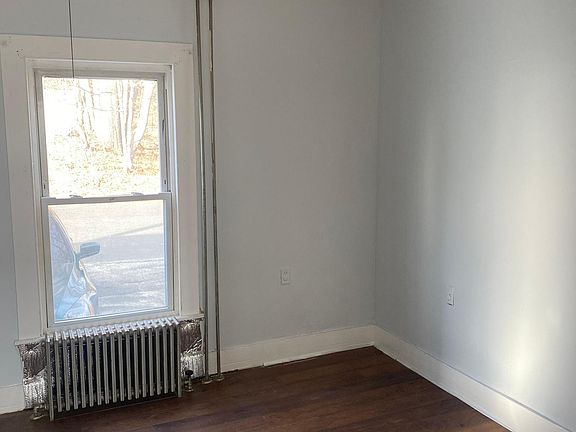 one of the 3 bedrooms