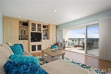 Wonderful living room that opens out to the patio and deck with ocean views.