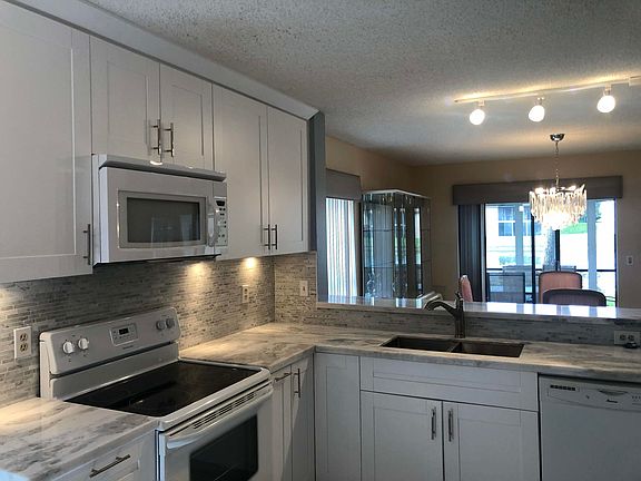Home For Sale In Palm Chase Lakes