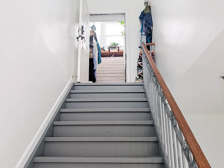 View of apartment entrance from building staircase