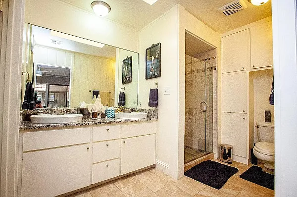 Master bath walk in closet to the left