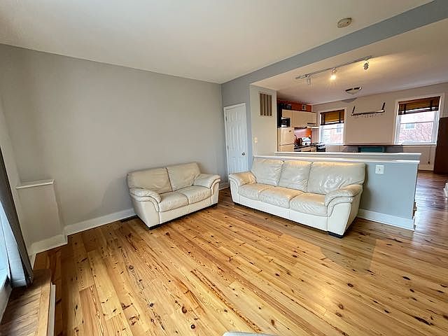 living room and kitchen (and setp to deck)