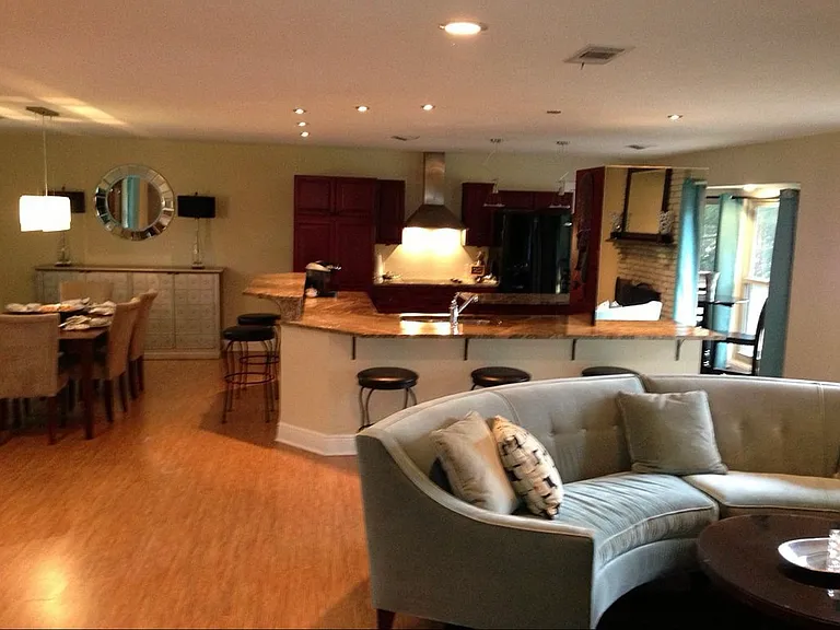 The view looking towards the kitchen and dinning area,
