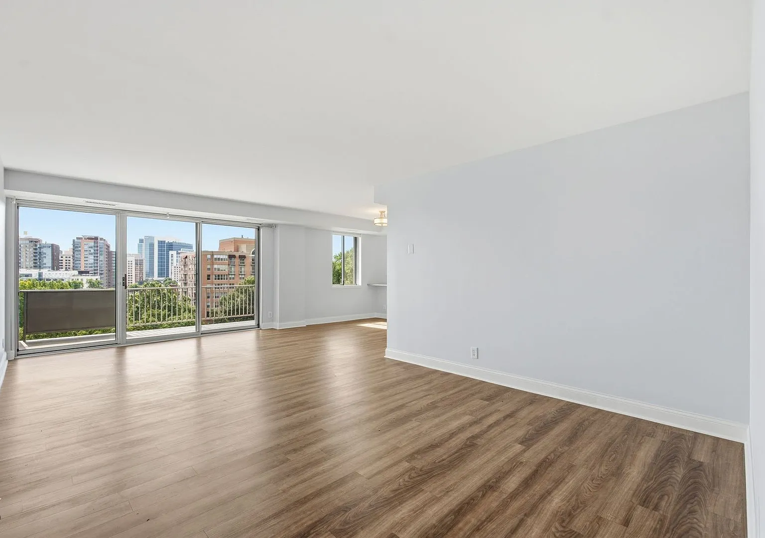Bright Top-Floor 2BR Condo in The Whitehall with Garage Parking! — Photo 1