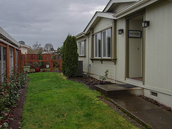 Front and fenced side yard