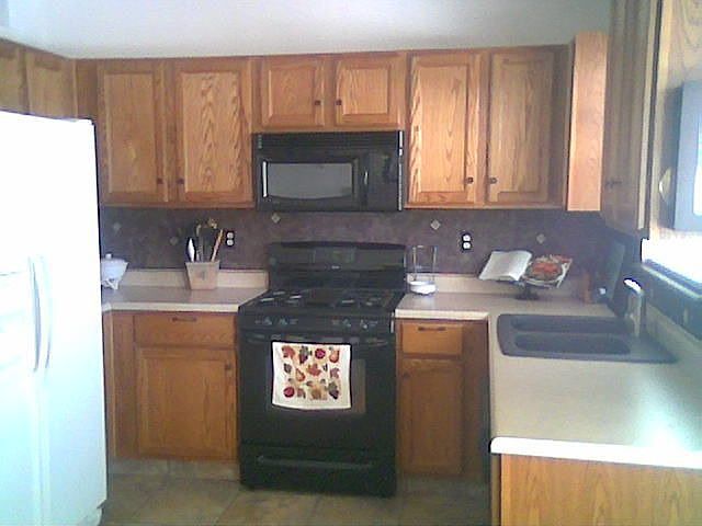 Eat in kitchen-lots of cabinets, a pantry, and bay window