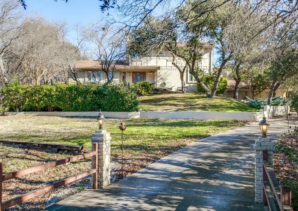 Stunning property on 1.3 acres with lots of trees. The home sits back on the lot for a very secluded